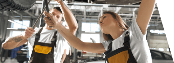 Mechanics working in workshop